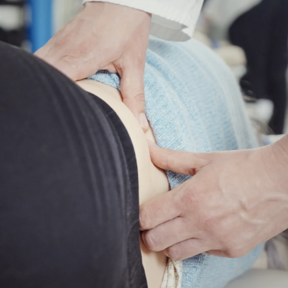 Deep muscle release on the lower back at Yorkville Sports Medicine